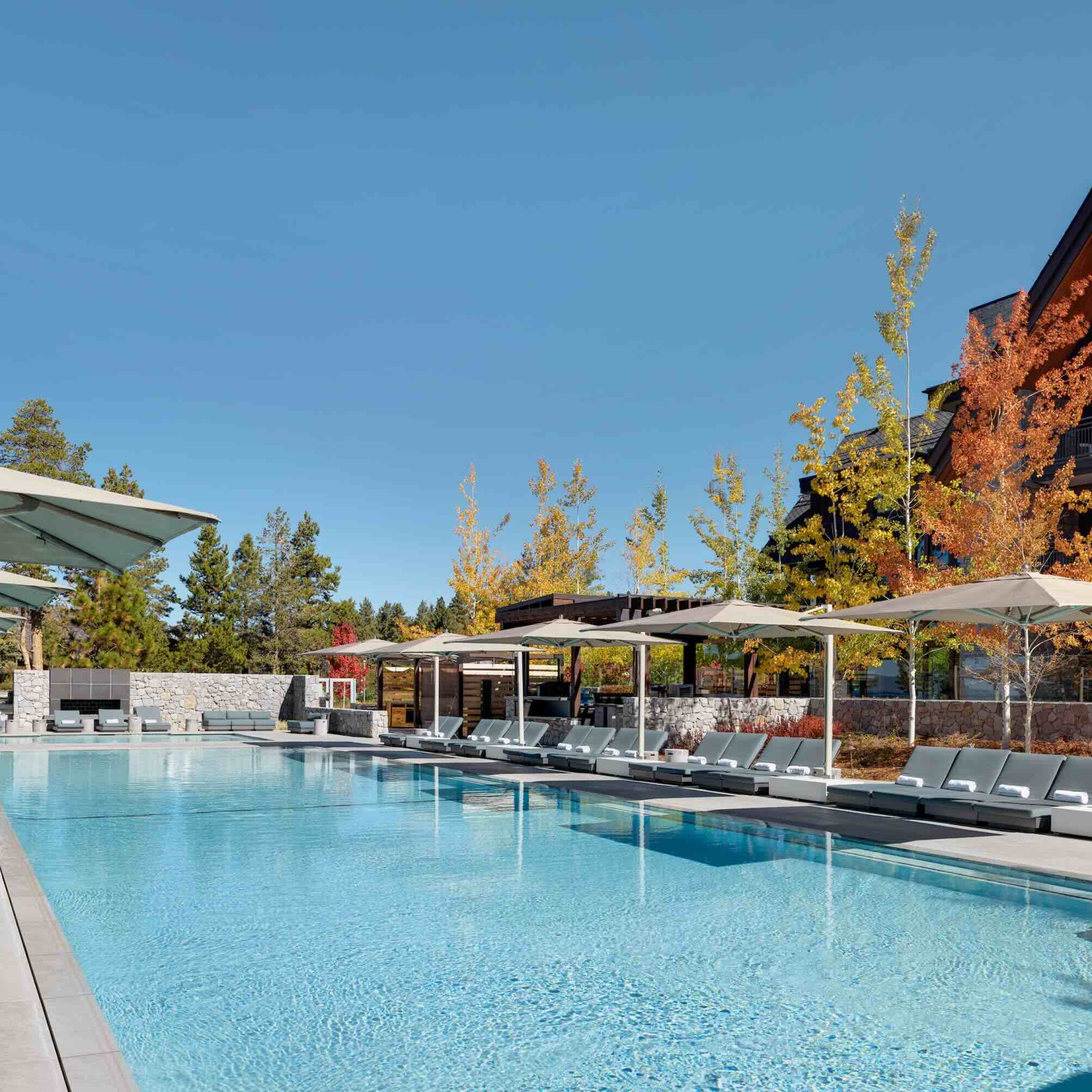 The swimming pool fronts the lake